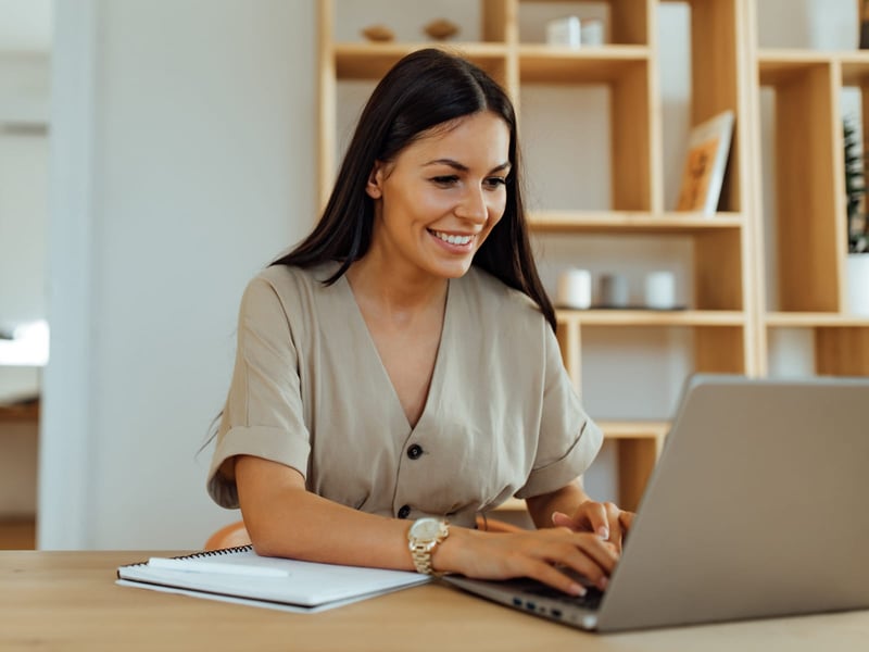 Woman working from home on laptop