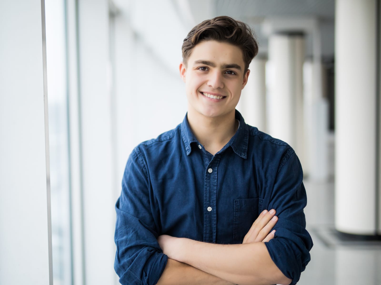 Young professional smiling in office